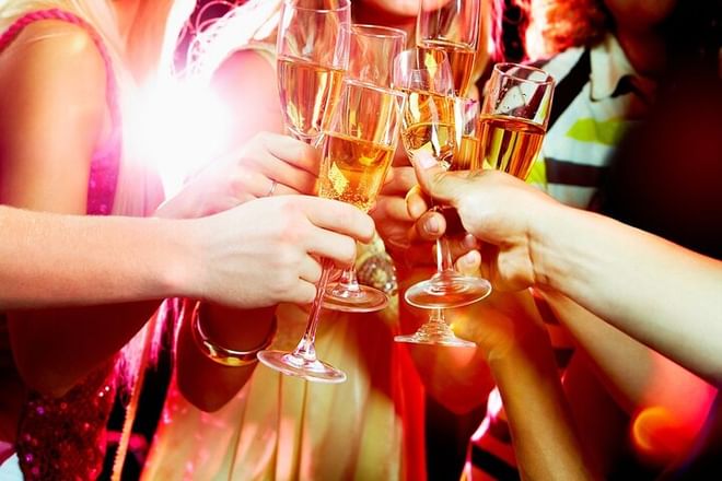 Free glass of champagne each