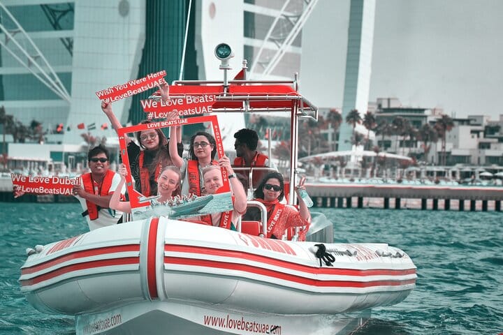 Pose for the perfect shot with the Burj Al Arab in the background on your thrilling Dubai Speedboat tour with LOVE BOATS!