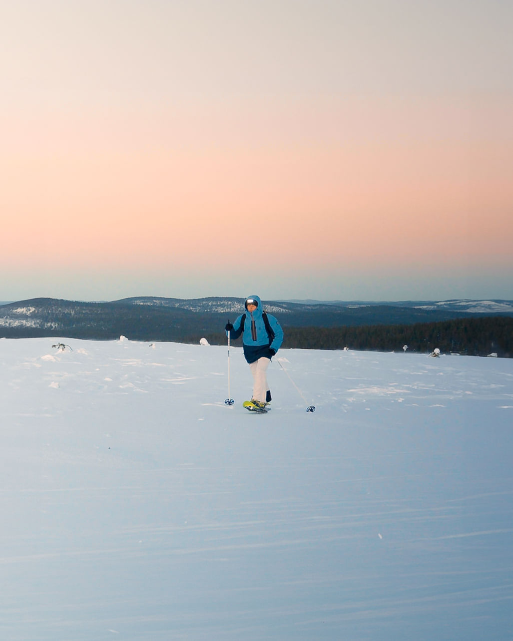 Snowshoeing through the Arctic landscape in Rovaniemi with StayLapland.