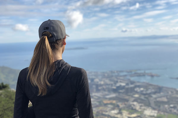 Adventurers ascend Table Mountain, with breathtaking city and ocean views.