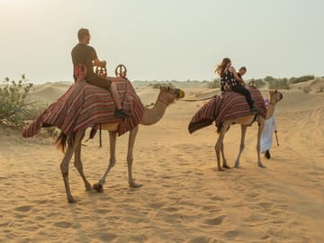 Desert Buggy Adventure with Camel Ride and Sandboarding in Sharjah