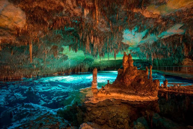 Heart of the Island: Cuevas del Drach and Visit to the Pearl Workshop