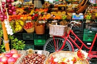 Fruit market with old bike in Campo di fiori in Rome
