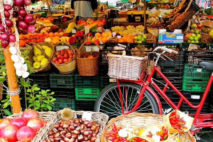 Fruit market with old bike in Campo di fiori in Rome