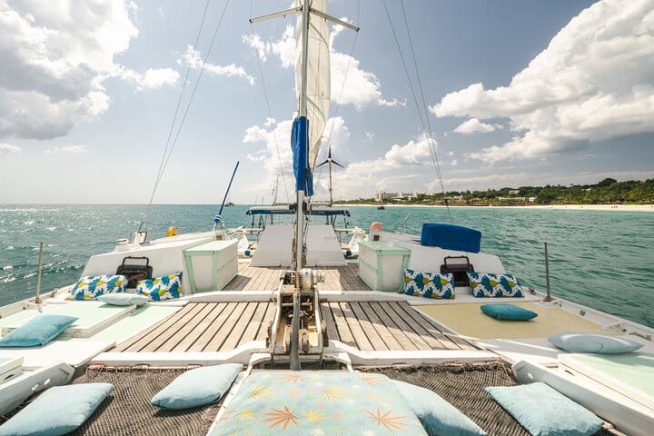 ChatGPT said: Enjoy a scenic catamaran cruise with spacious sunbathing decks and stunning views of the turquoise sea.