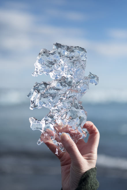 Crystal clear piece of ice found on Diamond Beach