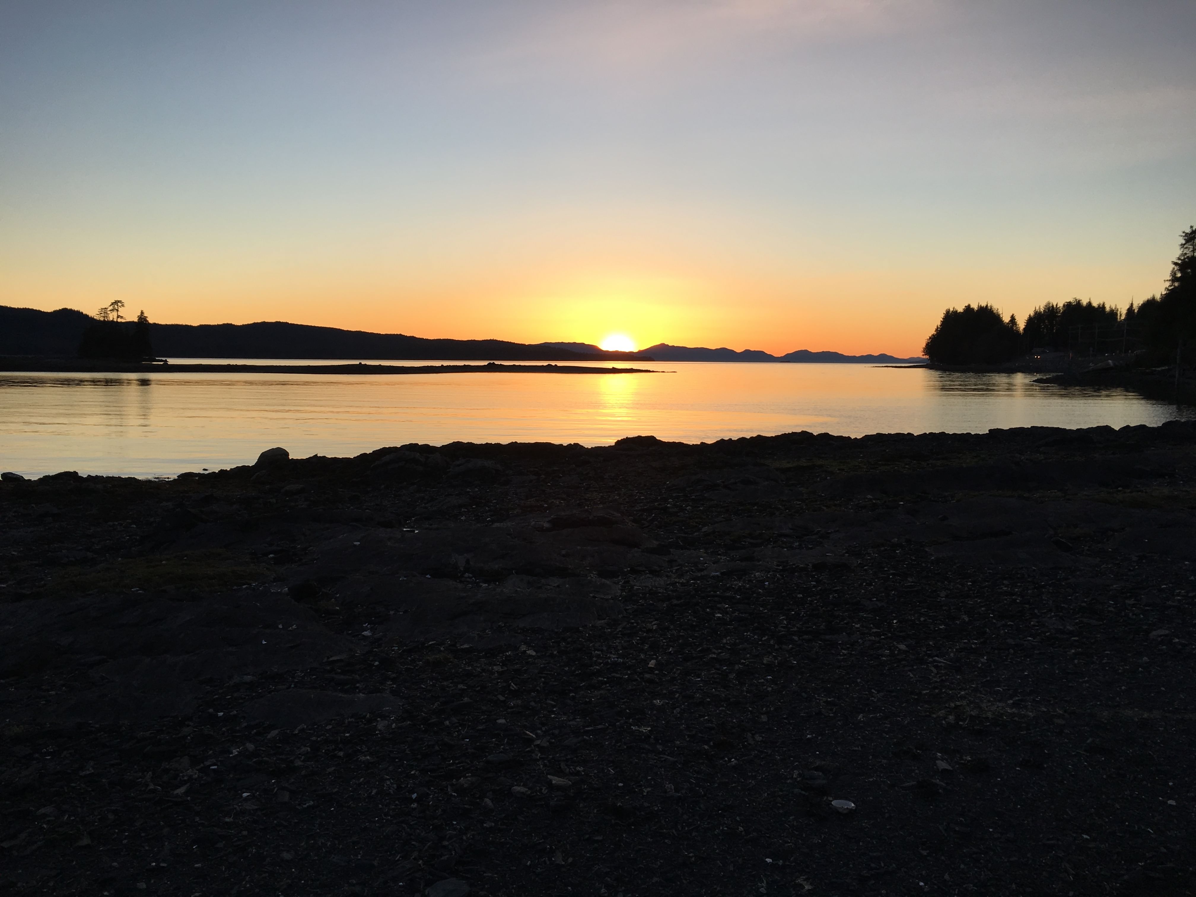 Sunset over calm water.