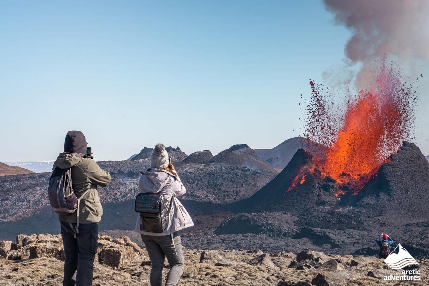 Taking picture of erupting volcano Iceland during 4 day tour Iceland