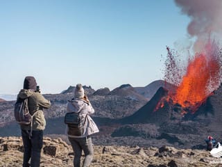 Taking picture of erupting volcano Iceland during 4 day tour Iceland