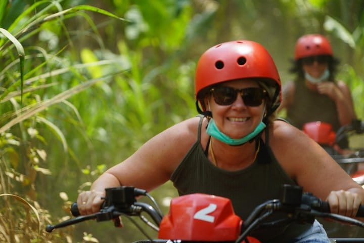laugh with friends on ATV ride