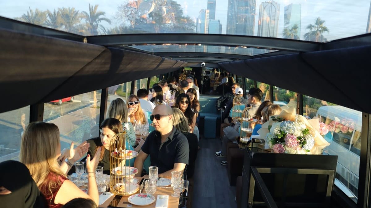Dubai: Bustronomy Gourmet Brunch, Afternoon Tea, or Dinner on a Luxury Glass-Roof Bus!