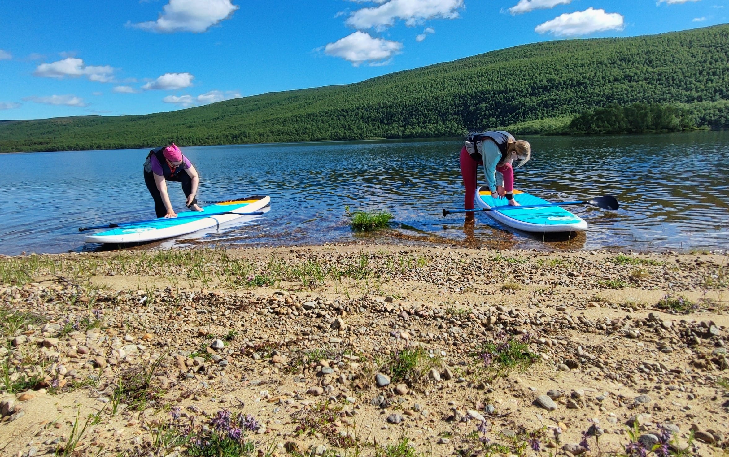 SUP board Utsjoki Mantojärvi, safety rope to anckle.