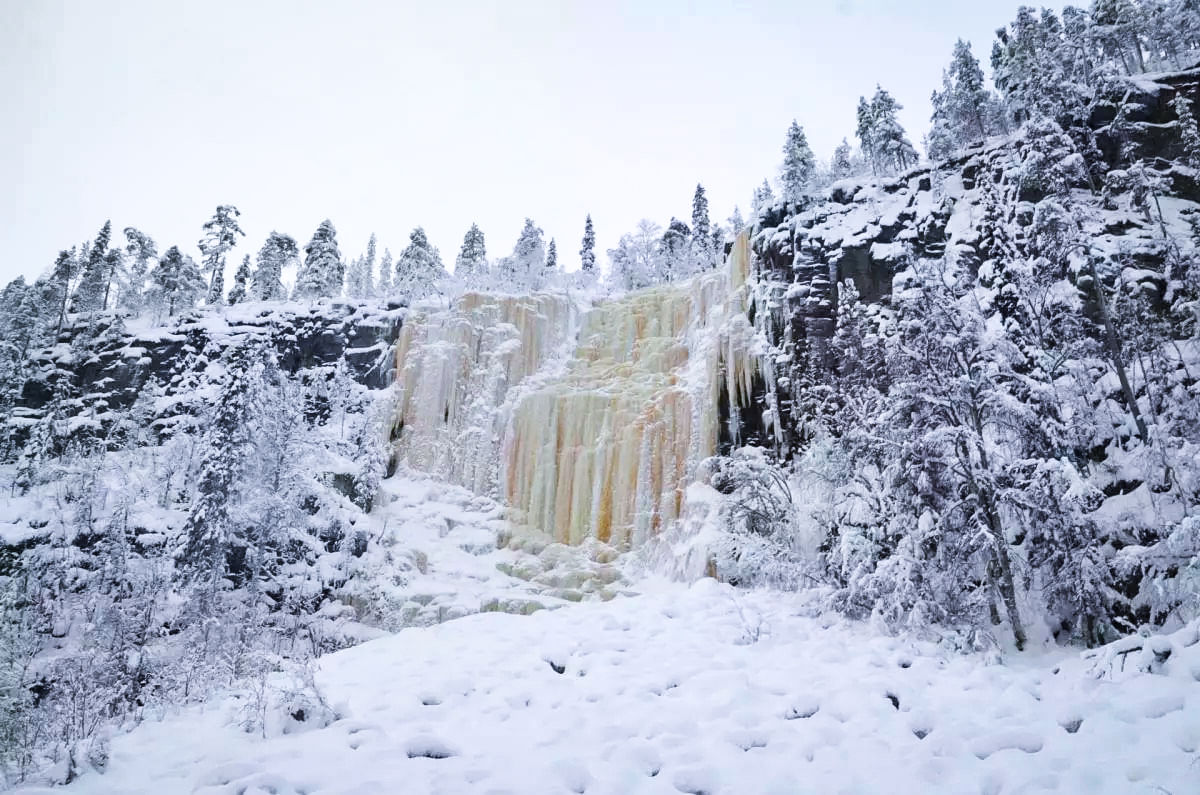 Majestic frozen waterfalls in Korouoma Canyon