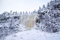 Majestic frozen waterfalls in Korouoma Canyon