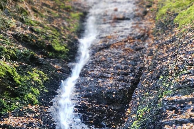 Waterfall within the grounds of sacred lands
