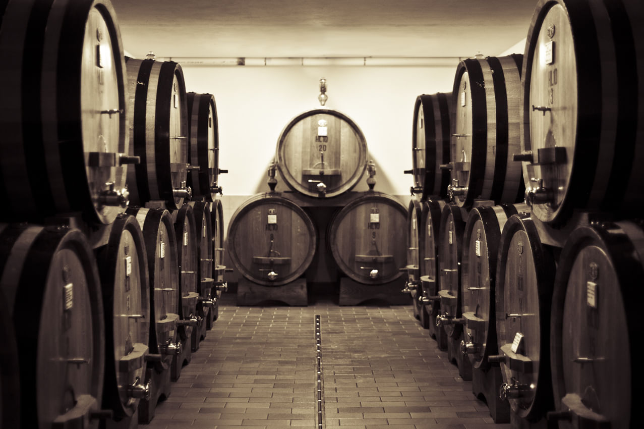 View of a cellar with the wooden barrells containing Chianti wine