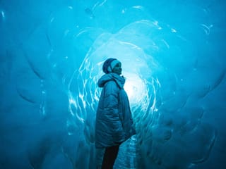a woman in katla ice cave