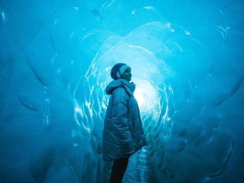 a woman in katla ice cave
