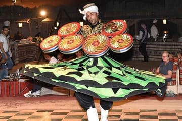 Evening Camel Ride and Dinner Experience in Lahbab Desert