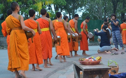 Morning Almsgiving and Market Tour in Luang Prabang