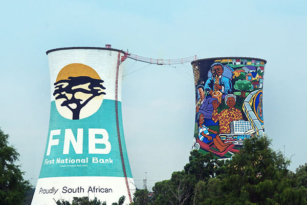 Iconic Soweto Towers and lively urban art.