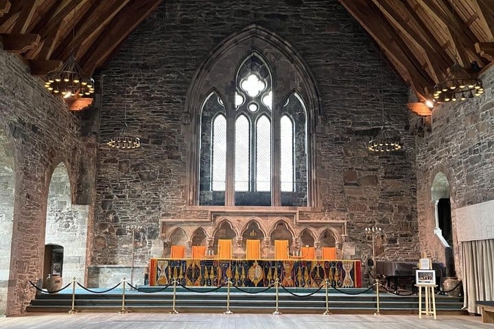 Medieval stone interior and arched window inside Håkonshallen