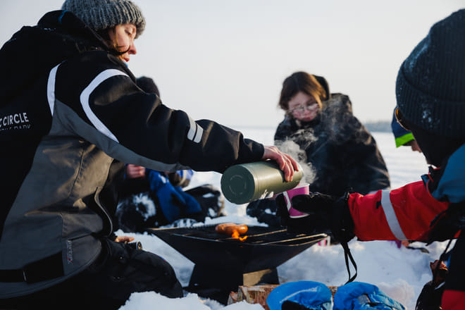 Ice Fishing and Snowmobile Safari Combo in Lapland 10