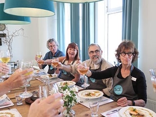 Paricipants celebrating a job well done at Salt Eldhus cookery school