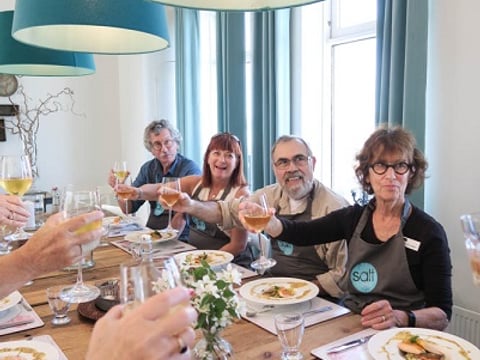 Paricipants celebrating a job well done at Salt Eldhus cookery school