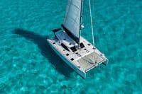Charter your private Cancun Catamaran for a luxury cruise featuring snorkeling in the turquoise water and a full open bar!