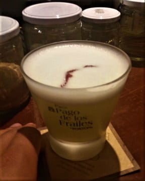 Discover Cusco by Night: Evening City Tour, Pisco Sour Class, and Traditional Dinner