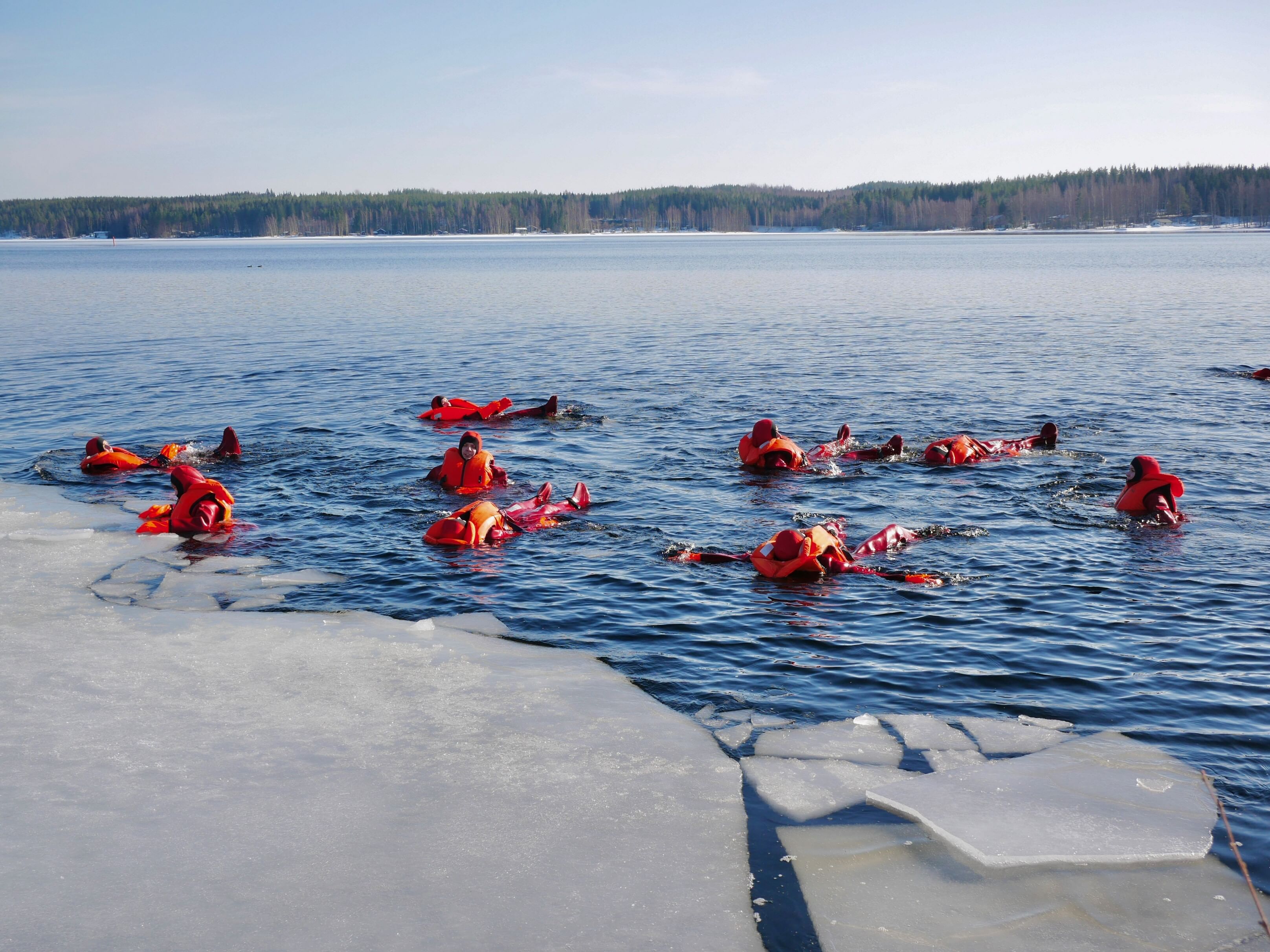 Ice floating in safety suits is a great winter experience