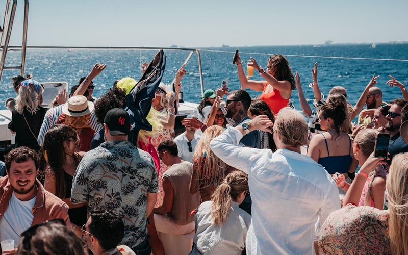 Hands up on the boat party deck