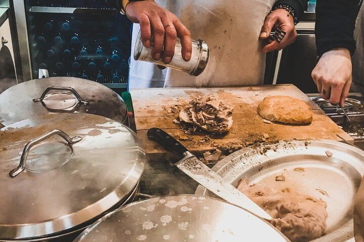 The making of the typical Lampredotto Sandwich