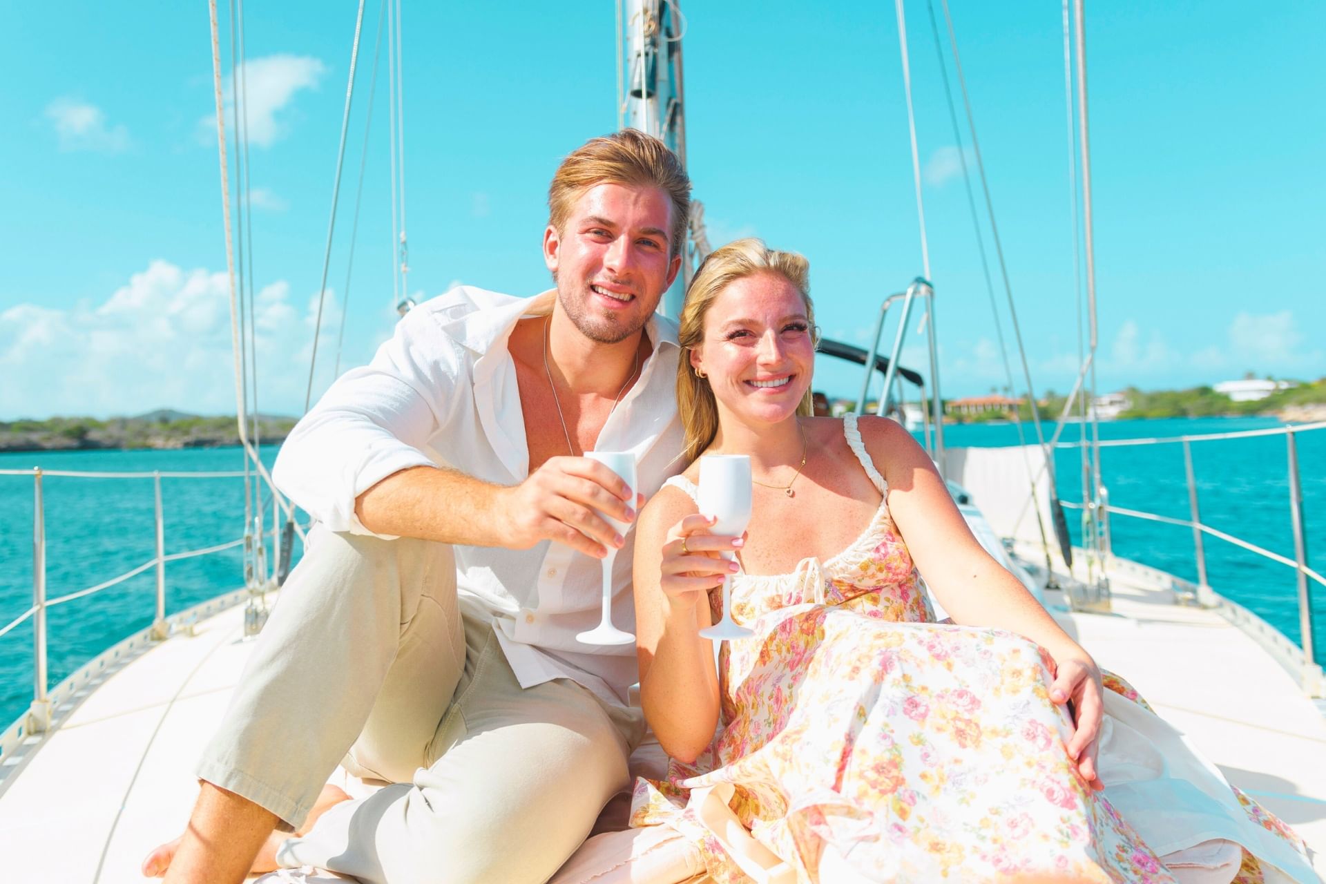 Romantic couple enjoying proposal tour on private yacht with Maxie Sailing