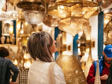 A moment from the private shopping Marrakech experience, exploring artisan workshops and lantern-lit alleys with a local guide.