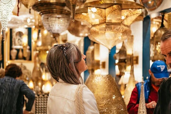 A moment from the private shopping Marrakech experience, exploring artisan workshops and lantern-lit alleys with a local guide.