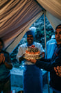Chef Julio with Cake at final dinner