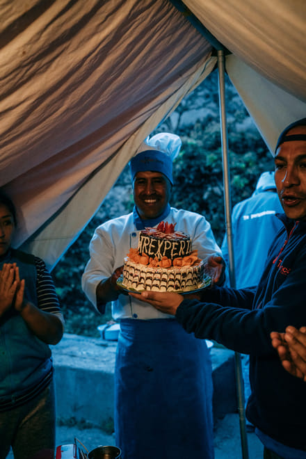Chef Julio with Cake at final dinner