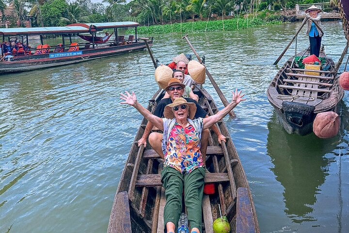 Rowing boat on the small canal of the Mekong River