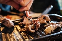 Travelers enjoy a hearty dinner of fire roasted vegetables and meat after a hard day’s work of exploring the area and life on the farm.