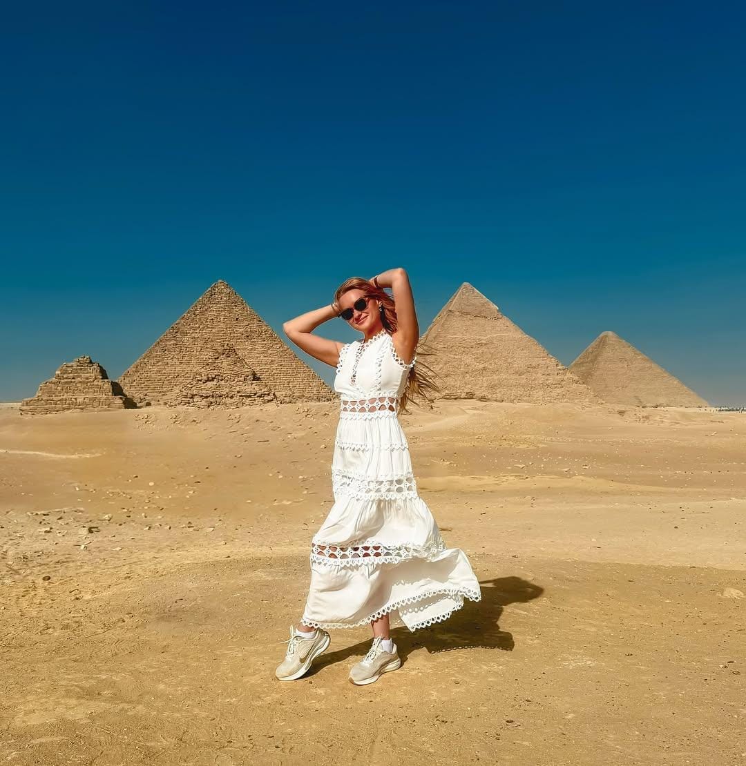 Guest admiring panoramic view during Cairo day trip.