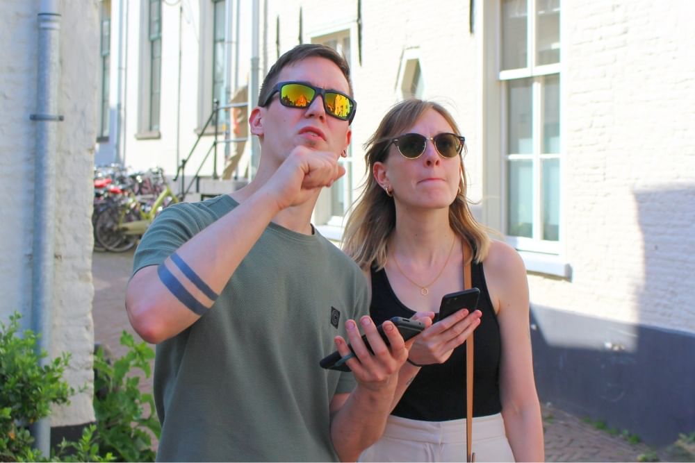 Mid-game thinking during the City Detective Eindhoven scavenger hunt at De Lichttoren. 