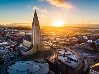 An aerial shot of Reykjavik City with Hallgrimmskirkja in the focus