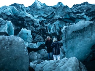 Having a laugh amongst the elements at Seljalandsfoss waterfall Iceland