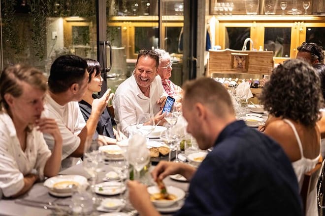 Exclusivity redefined — A private group of 10 revels in their VIP dining experience in a secluded, elegant room.