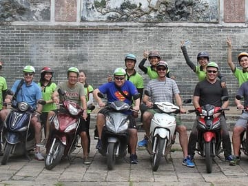 Ho Chi Minh City street food and city tour by motorbike