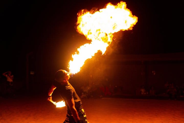 Fire-breather performs at a desert camp near Dubai.