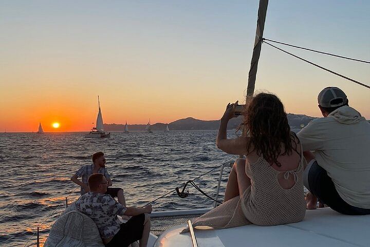 Santorini Sunset Catamaran Cruise with BBQ Dinner, Drinks & Transfers