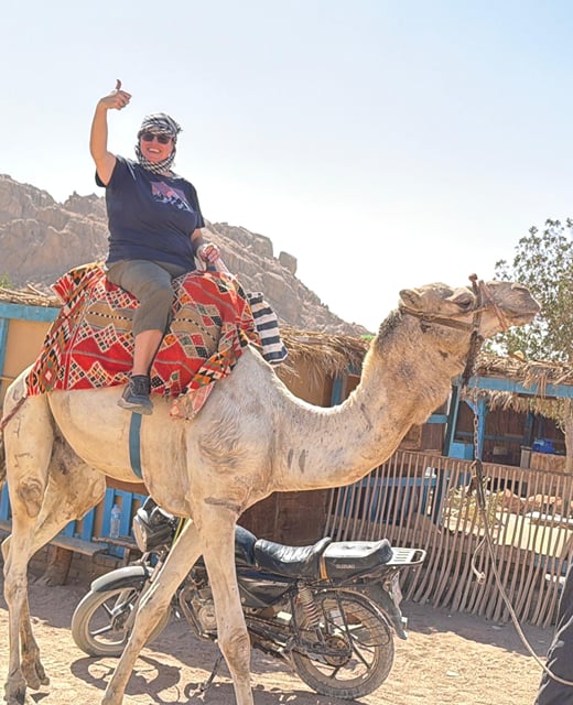 Guest on a camel ride, Sinai desert